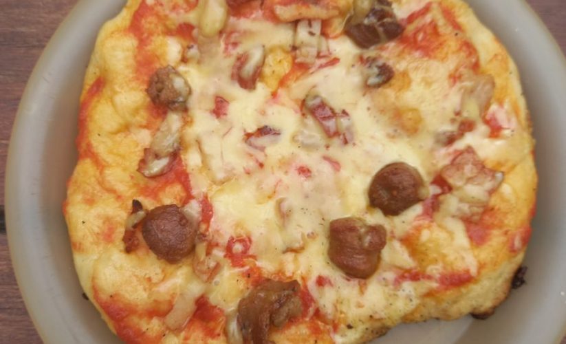 Pizza in the camp oven